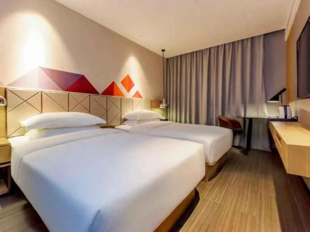 Bed in Borrman Hotel Guangzhou Quzhuang Metro Station