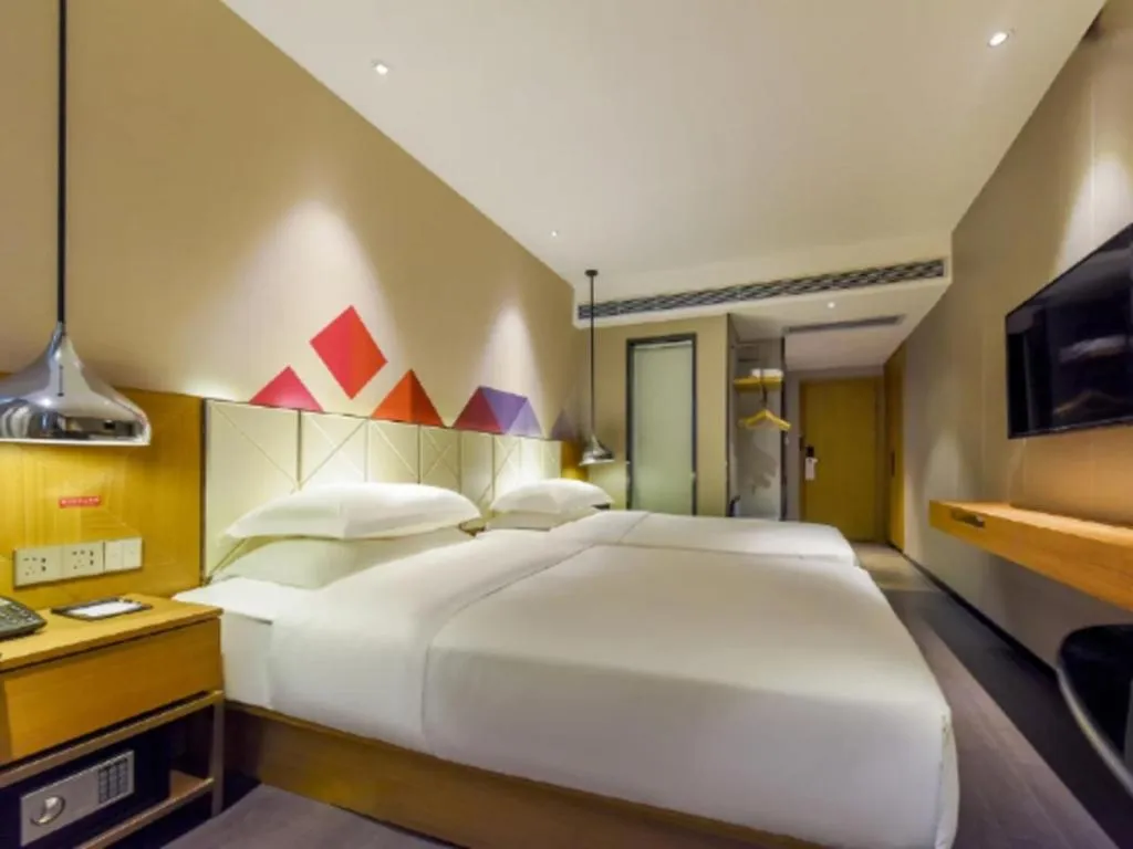 Bed in Borrman Hotel Guangzhou Quzhuang Metro Station