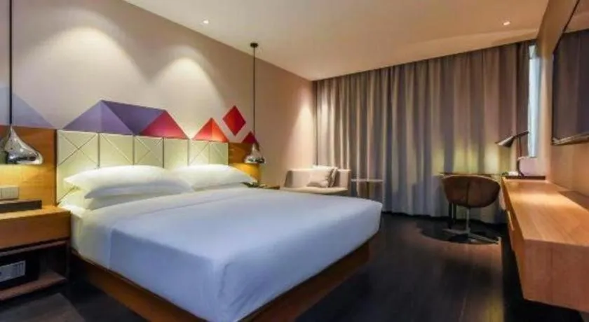 Bed in Borrman Hotel Guangzhou Quzhuang Metro Station