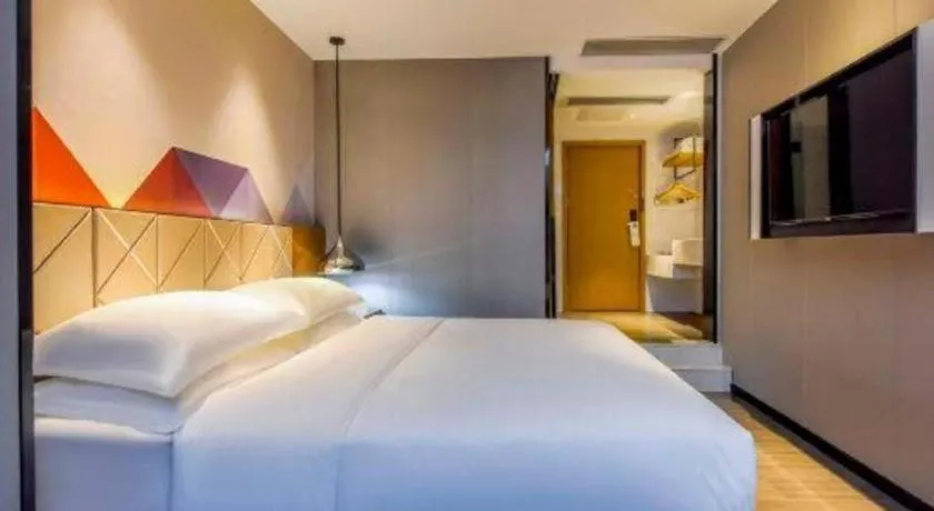 Bed in Borrman Hotel Guangzhou Quzhuang Metro Station