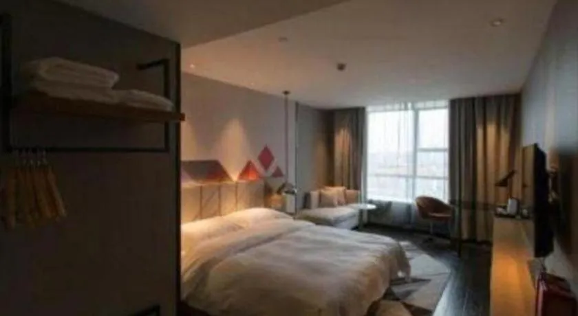 Bed in Borrman Hotel Guangzhou Quzhuang Metro Station