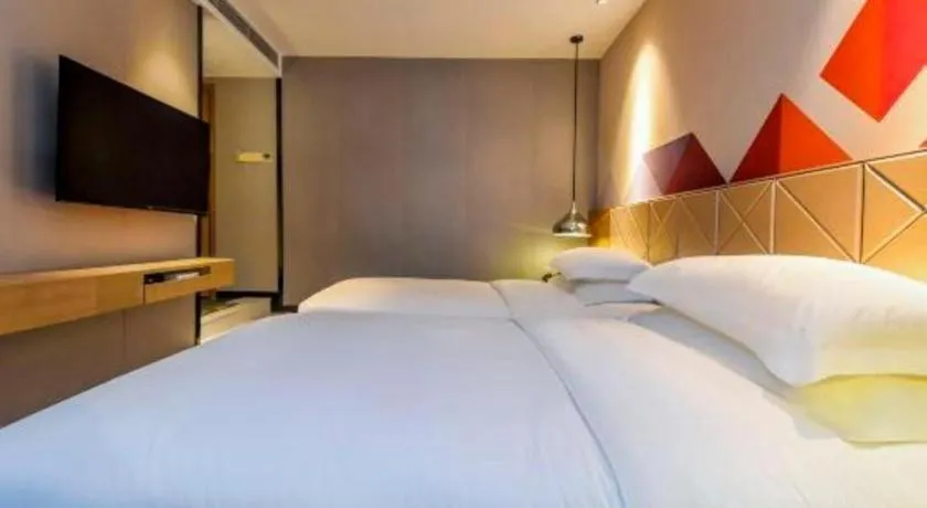 Bed in Borrman Hotel Guangzhou Quzhuang Metro Station