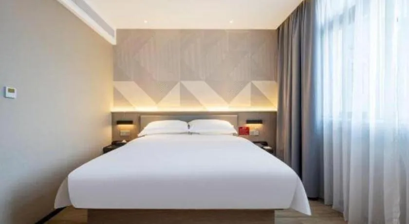 Bed in Borrman Hotel Guangzhou Quzhuang Metro Station