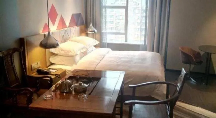 Bed in Borrman Hotel Guangzhou Quzhuang Metro Station