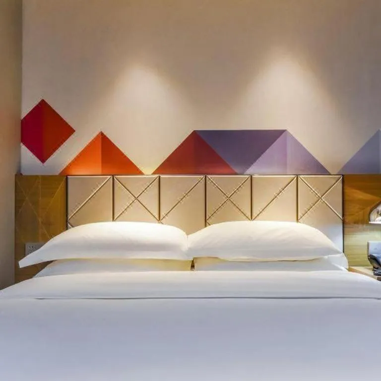 Bed in Borrman Hotel Guangzhou Quzhuang Metro Station