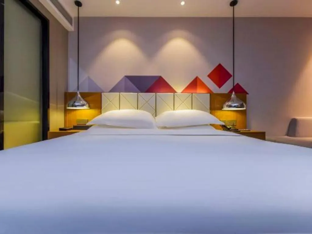 Bed in Borrman Hotel Guangzhou Quzhuang Metro Station