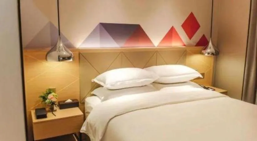 Bed in Borrman Hotel Guangzhou Quzhuang Metro Station