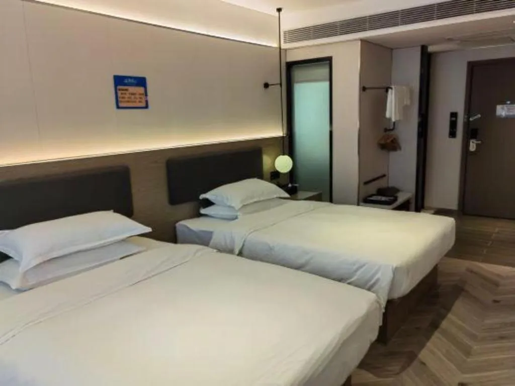 Bed in Borrman Hotel Guangzhou Quzhuang Metro Station