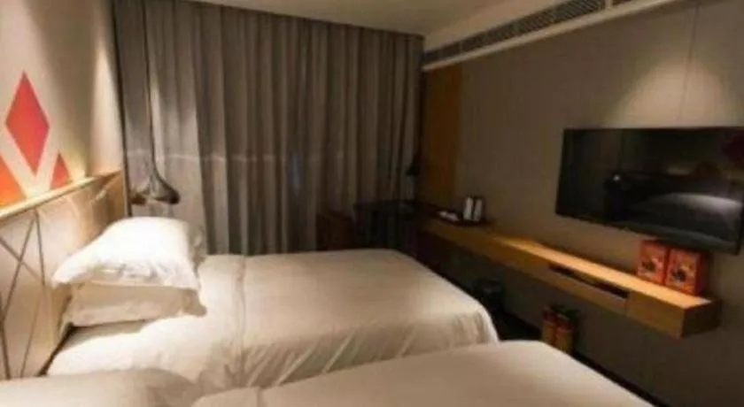 Bed in Borrman Hotel Guangzhou Quzhuang Metro Station