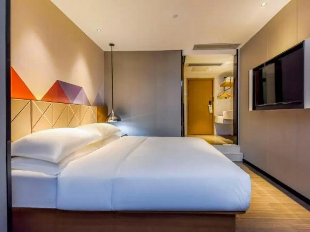 Bed in Borrman Hotel Guangzhou Quzhuang Metro Station