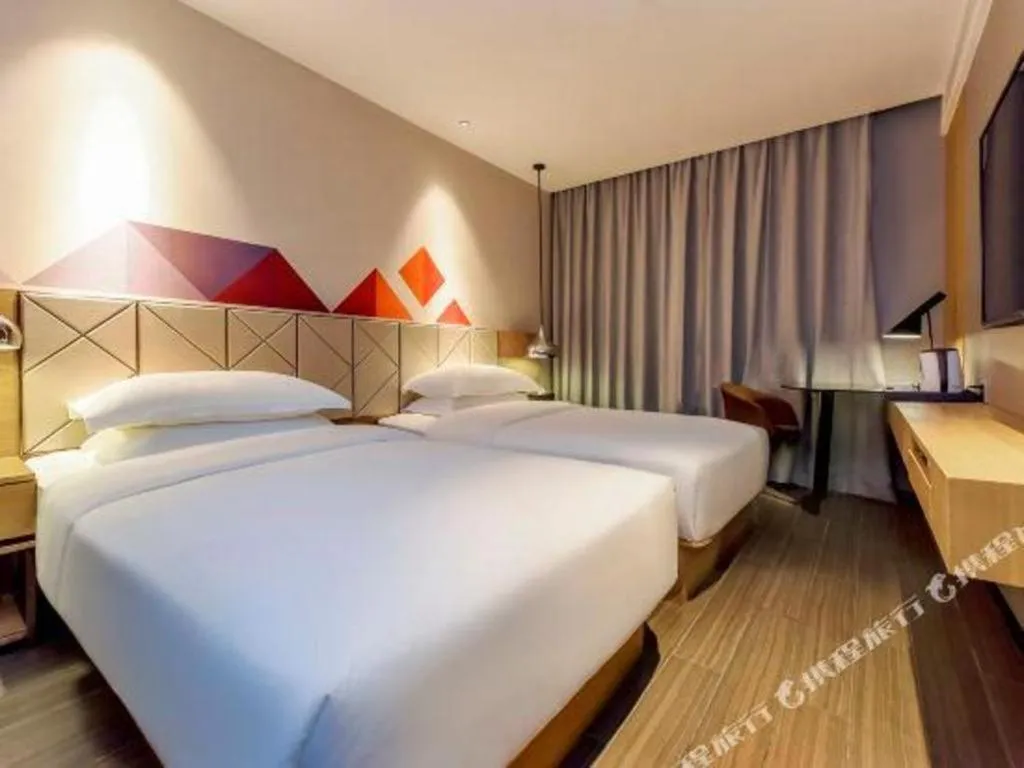 Bed in Borrman Hotel Guangzhou Quzhuang Metro Station