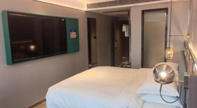 Bed in Borrman Hotel Guangzhou Quzhuang Metro Station