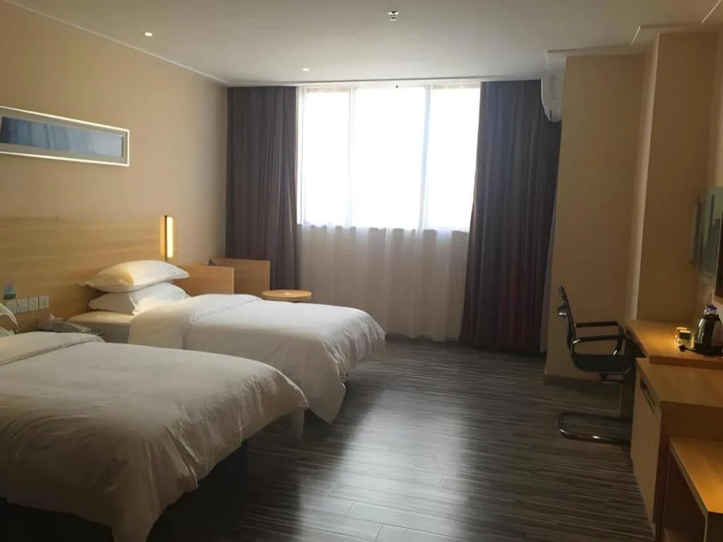 Bed in City Comfort Inn Guangzhou Zhongluotan Culture Square