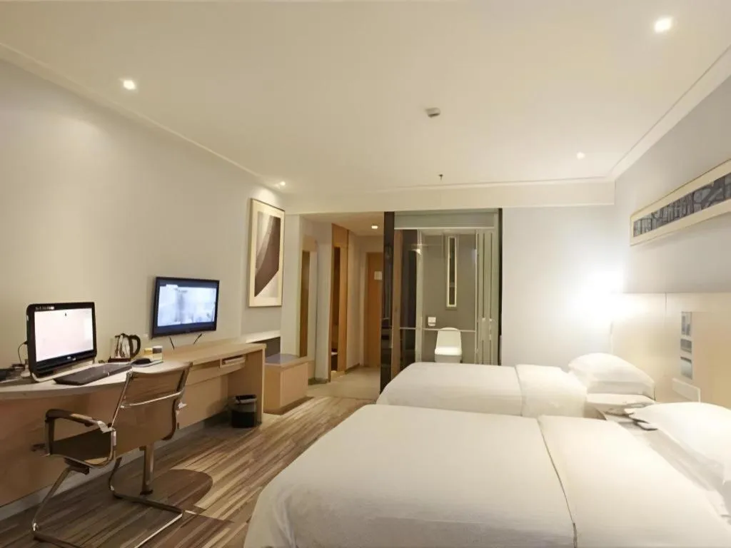 Bed in City Comfort Inn Guangzhou Zhongluotan Culture Square