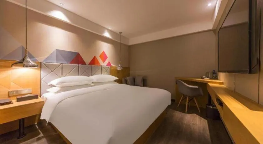 Bed in Borrman Hotel Kunming Dianchi South Asia Fengqingyuan