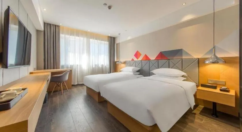 Bed in Borrman Hotel Kunming Dianchi South Asia Fengqingyuan