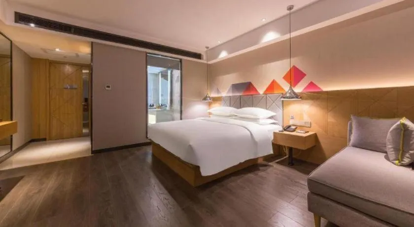 Bed in Borrman Hotel Kunming Dianchi South Asia Fengqingyuan