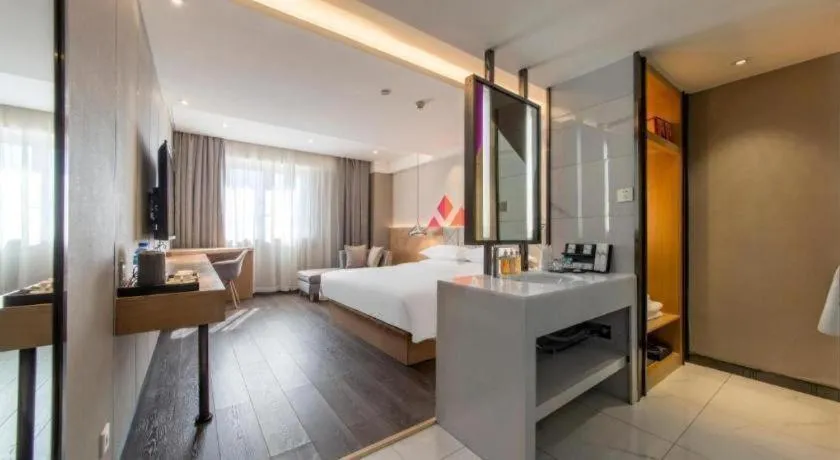 Bed in Borrman Hotel Kunming Dianchi South Asia Fengqingyuan