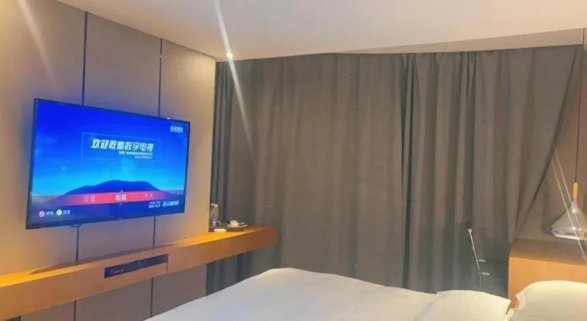 Bed in Borrman Hotel Kunming Dianchi South Asia Fengqingyuan