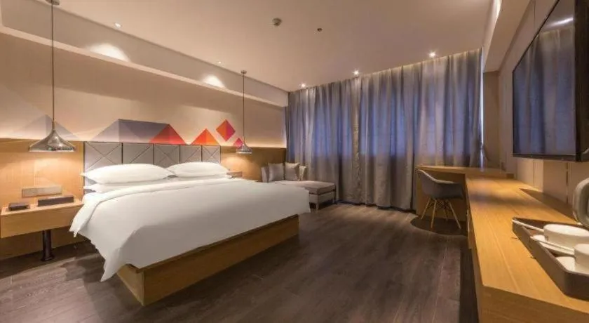 Bed in Borrman Hotel Kunming Dianchi South Asia Fengqingyuan