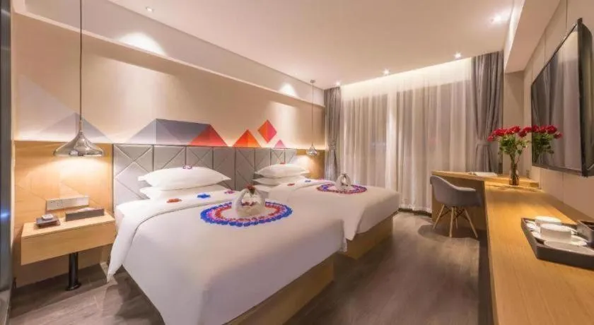 Bed in Borrman Hotel Kunming Dianchi South Asia Fengqingyuan