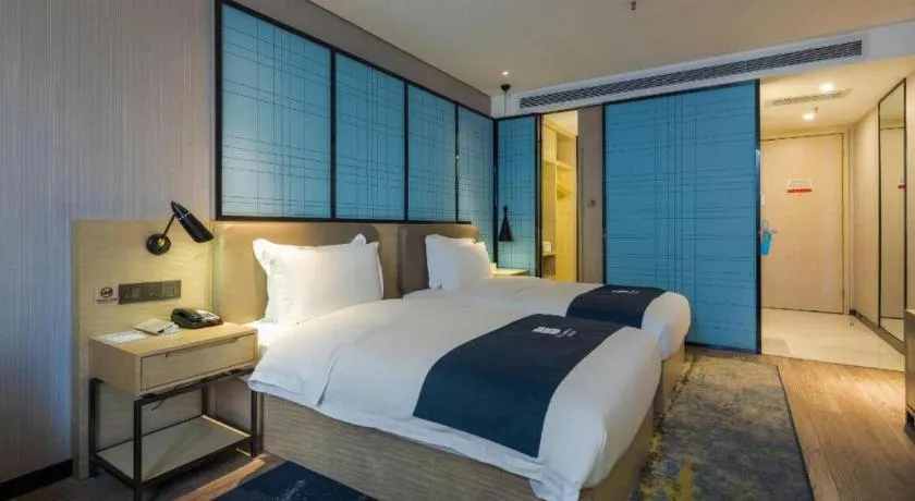 Bed in Echarm Hotel Kunming High-tech Zone Economic Management College