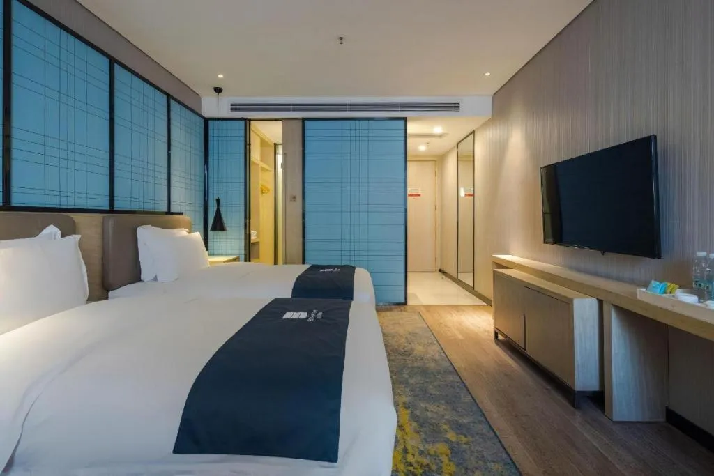 Bed in Echarm Hotel Kunming High-tech Zone Economic Management College