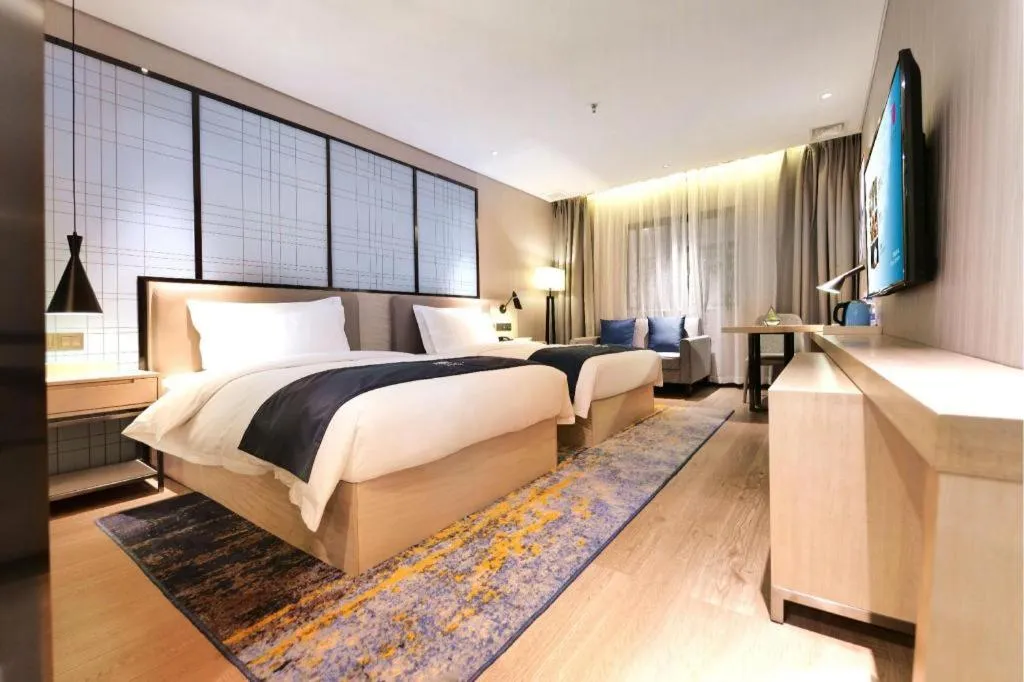 Bed in Echarm Hotel Kunming High-tech Zone Economic Management College