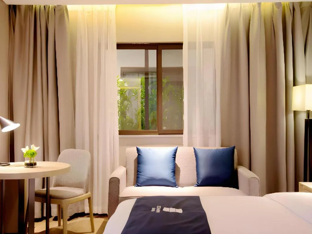 Bed in Echarm Hotel Kunming High-tech Zone Economic Management College