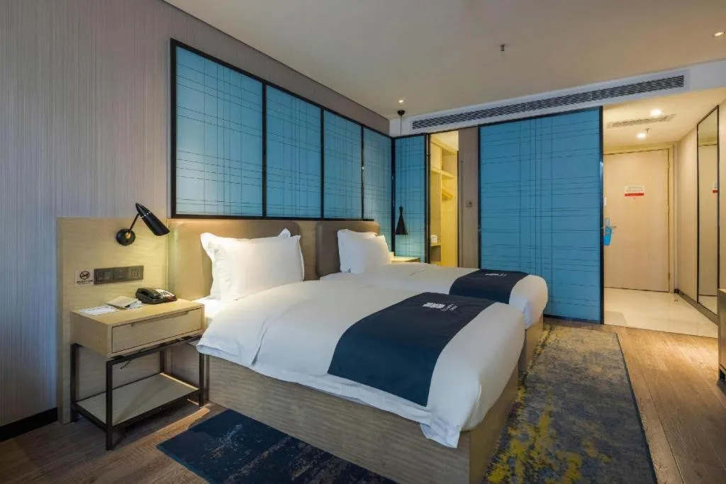 Bed in Echarm Hotel Kunming High-tech Zone Economic Management College