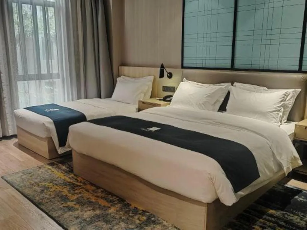 Bed in Echarm Hotel Kunming High-tech Zone Economic Management College