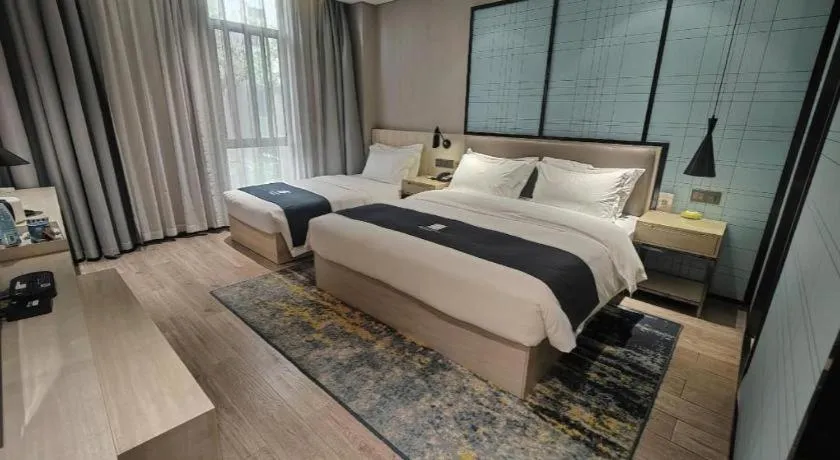 Bed in Echarm Hotel Kunming High-tech Zone Economic Management College