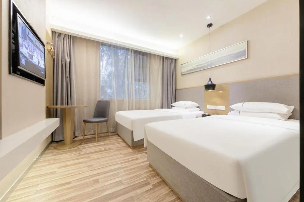 Bed in City Comfort Inn Wuhan Xudong Street Wangjiadun Metro Station