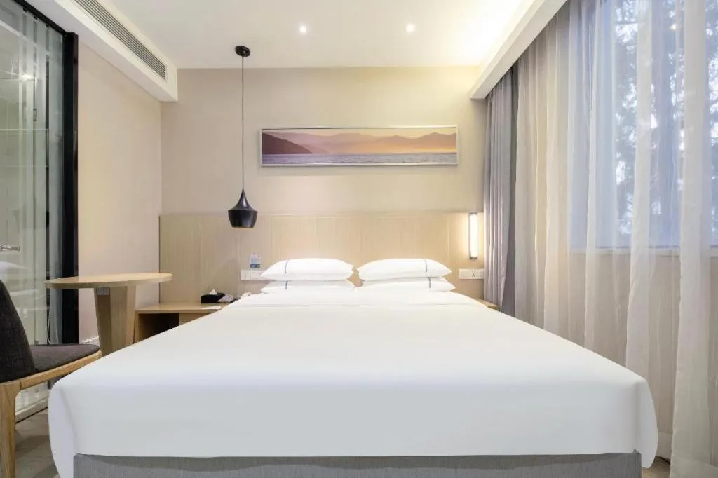 Bed in City Comfort Inn Wuhan Xudong Street Wangjiadun Metro Station