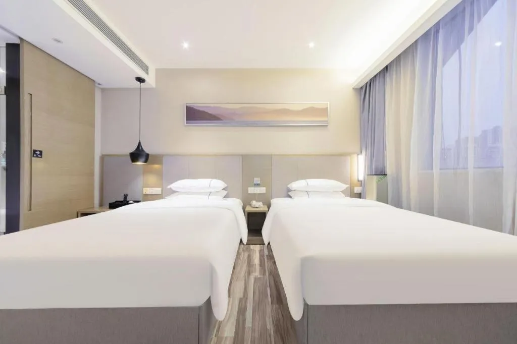 Bed in City Comfort Inn Wuhan Xudong Street Wangjiadun Metro Station