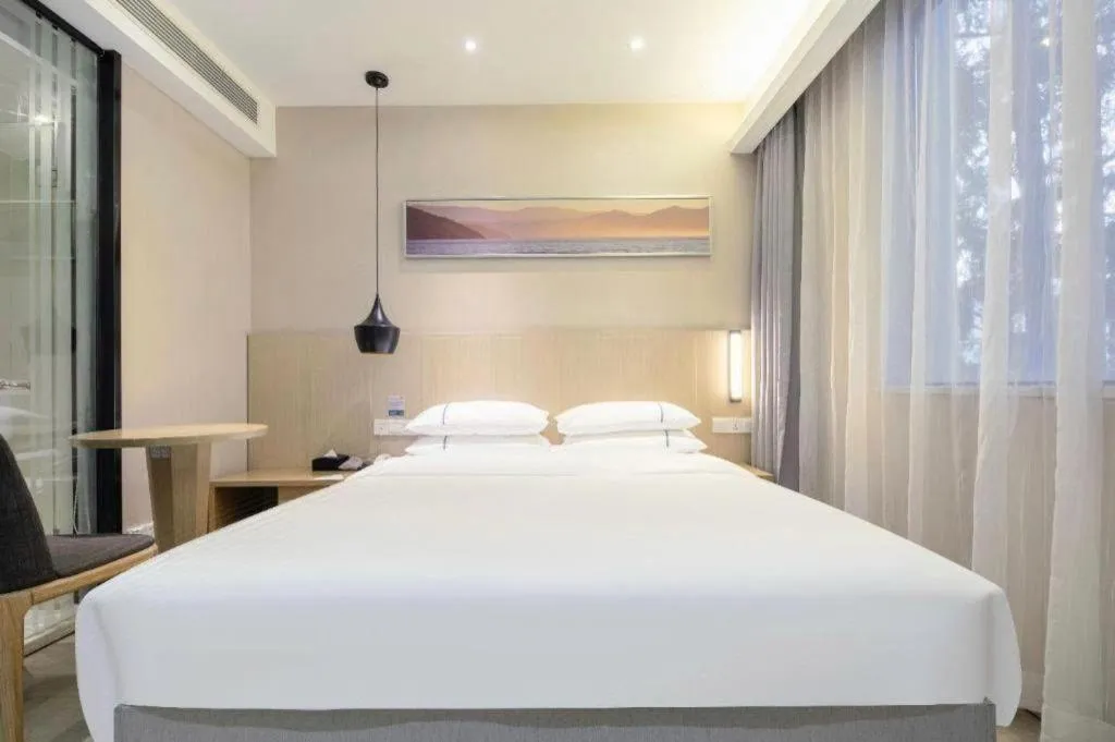 Bed in City Comfort Inn Wuhan Xudong Street Wangjiadun Metro Station