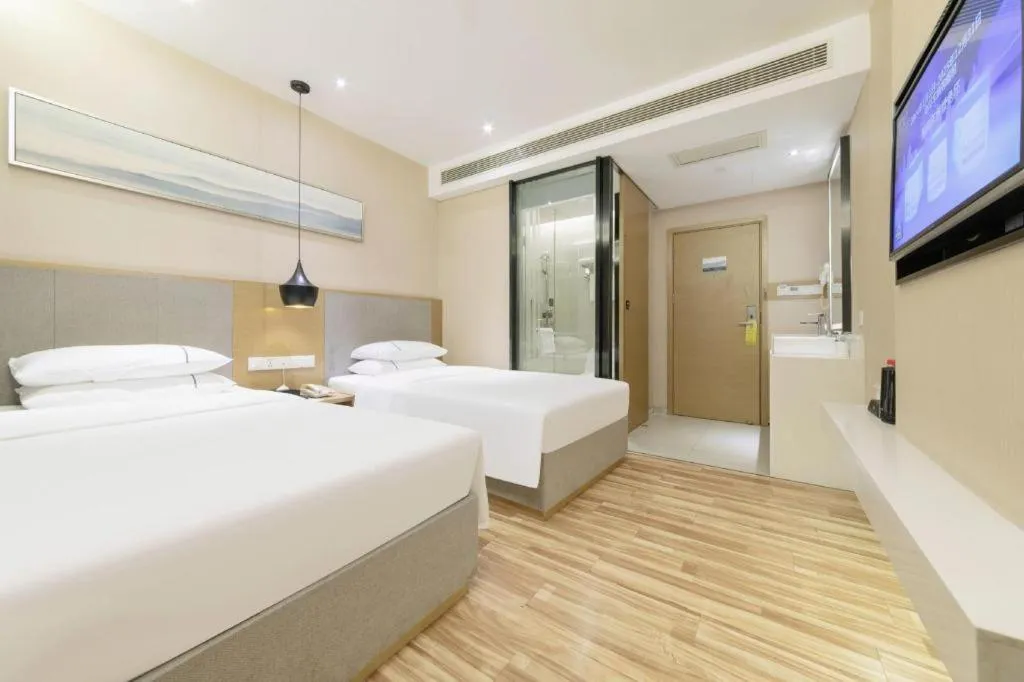 Bed in City Comfort Inn Wuhan Xudong Street Wangjiadun Metro Station