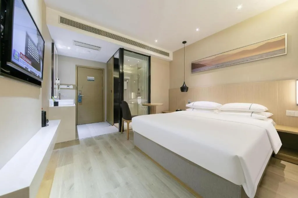 Bed in City Comfort Inn Wuhan Xudong Street Wangjiadun Metro Station