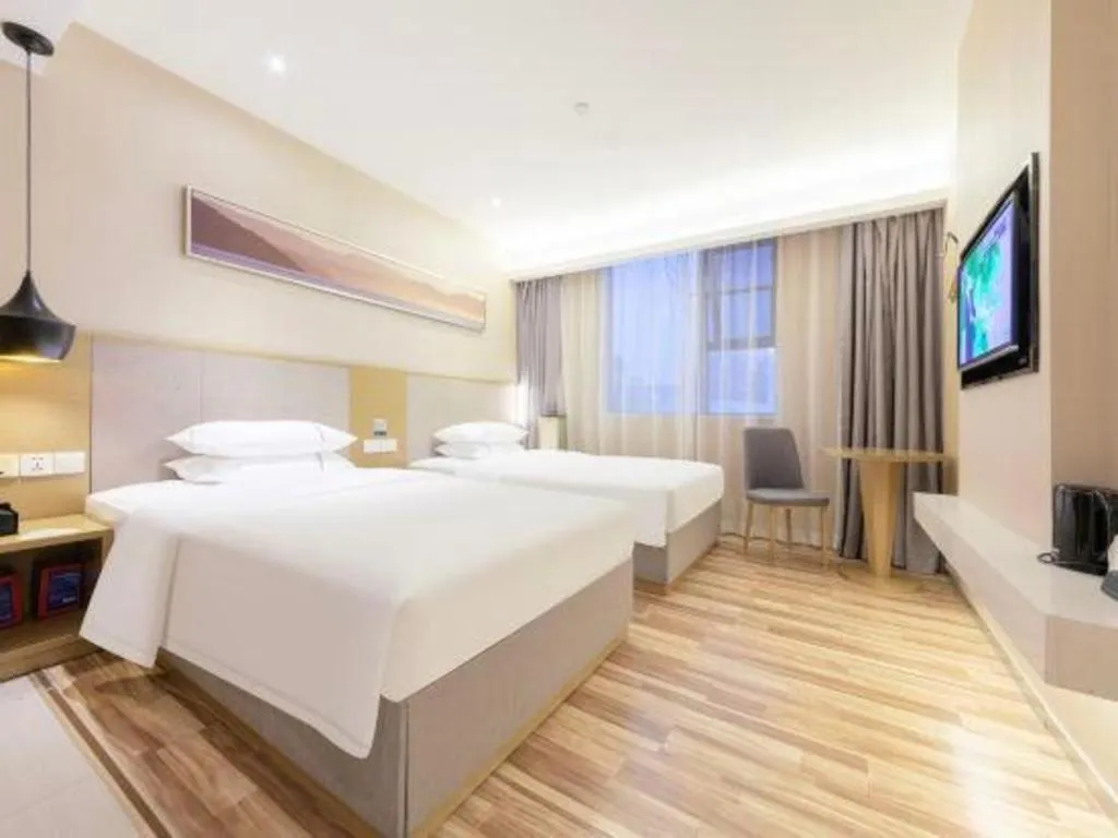 Bed in City Comfort Inn Wuhan Xudong Street Wangjiadun Metro Station