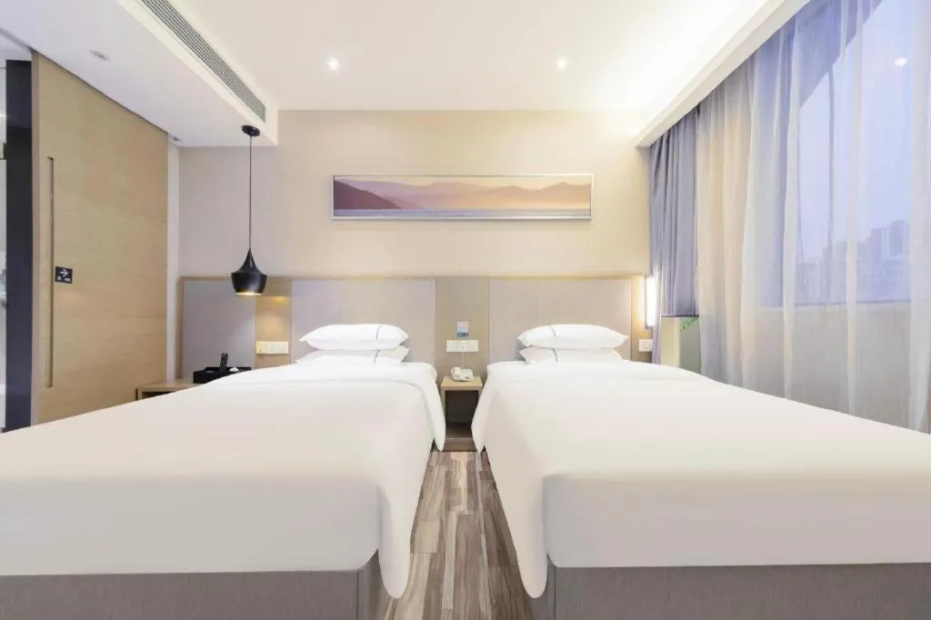 Bed in City Comfort Inn Wuhan Xudong Street Wangjiadun Metro Station