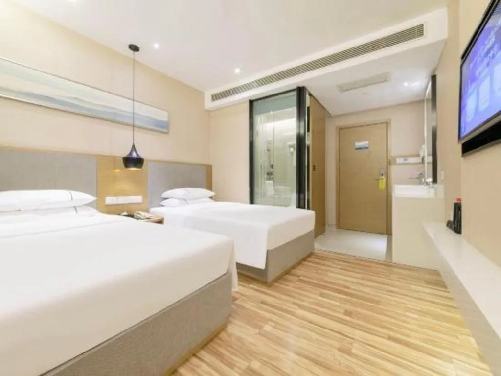Bed in City Comfort Inn Wuhan Xudong Street Wangjiadun Metro Station