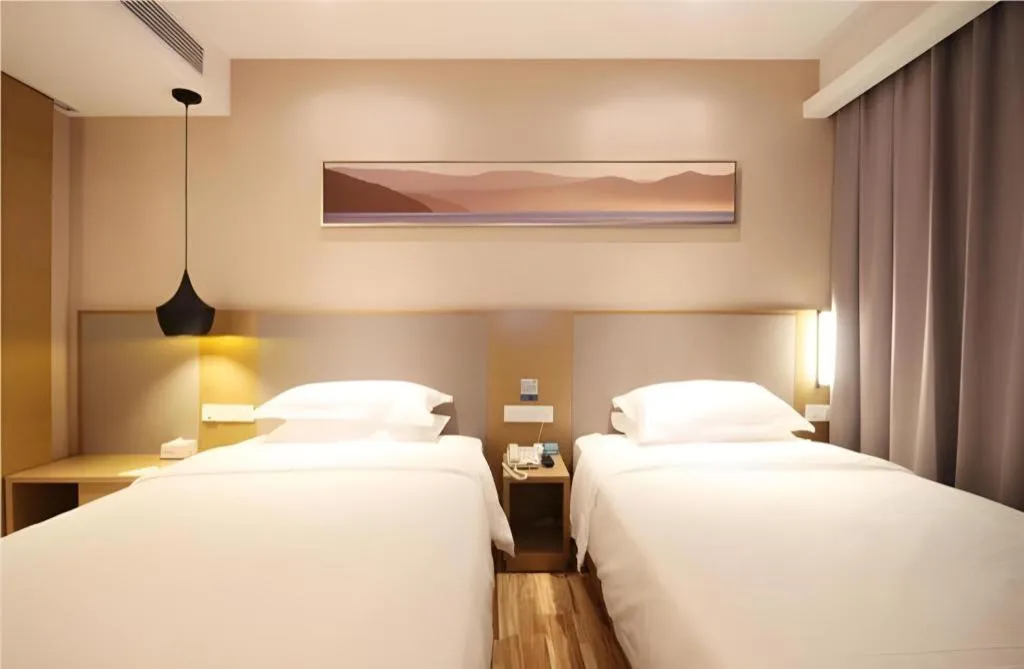 Bed in City Comfort Inn Wuhan Xudong Street Wangjiadun Metro Station