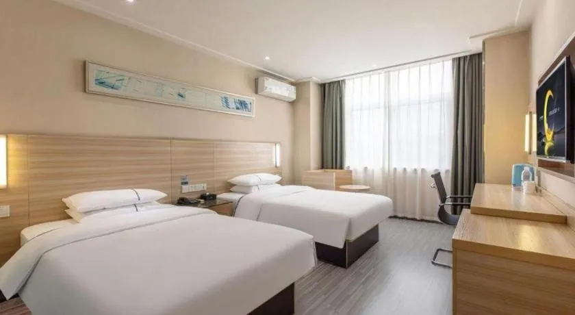 Bed in City Comfort Inn Wuhan Fengshu Er Road Baijin Mansion