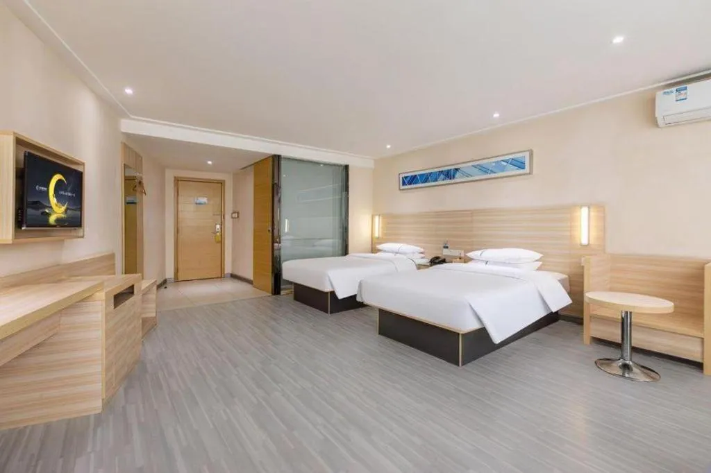Bed in City Comfort Inn Wuhan Fengshu Er Road Baijin Mansion