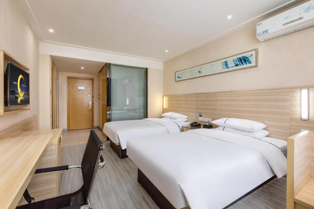 Bed in City Comfort Inn Wuhan Fengshu Er Road Baijin Mansion