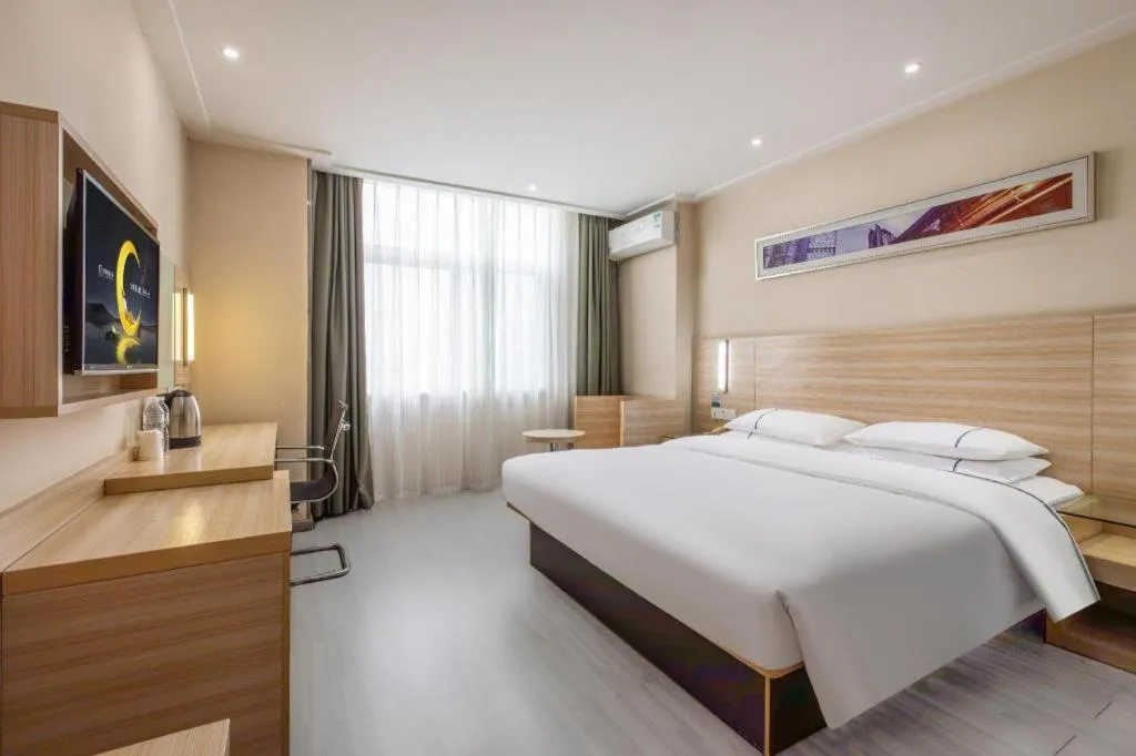 Bed in City Comfort Inn Wuhan Fengshu Er Road Baijin Mansion