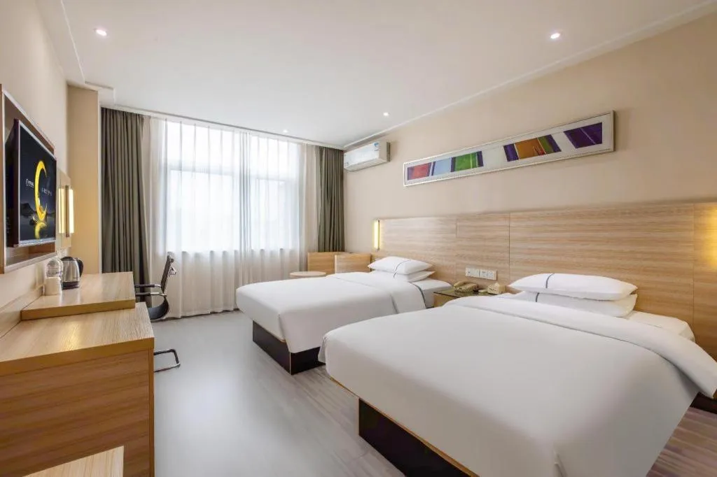 Bed in City Comfort Inn Wuhan Fengshu Er Road Baijin Mansion