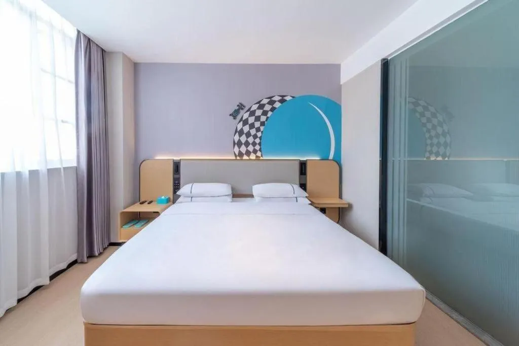 Bed in City Comfort Inn Zhongshan Nanqu Subdistrict Yong'an Square