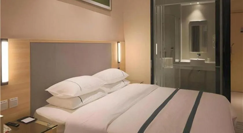 Bed in City Comfort Inn Zhongshan Nanqu Subdistrict Yong'an Square