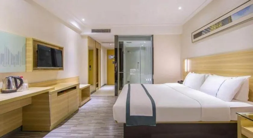 Bed in City Comfort Inn Zhongshan Nanqu Subdistrict Yong'an Square